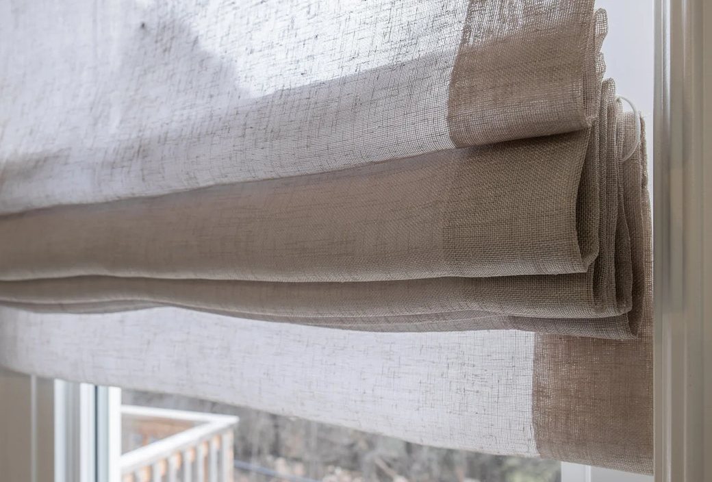Detail of a custom Roman shade fold and fabric